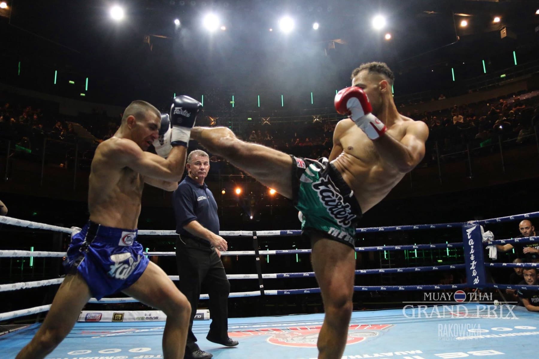 High kick thrown in the ring